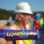 Lizard Lips lip balm with worker in hard hat